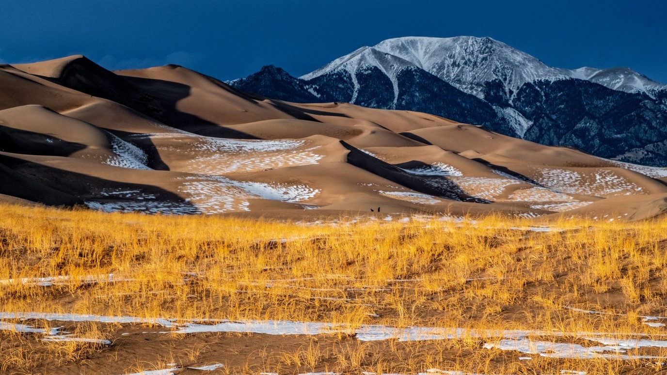 Great Sand Dunes under the snow capped Sangre de Cristo range in the San Luis Valley