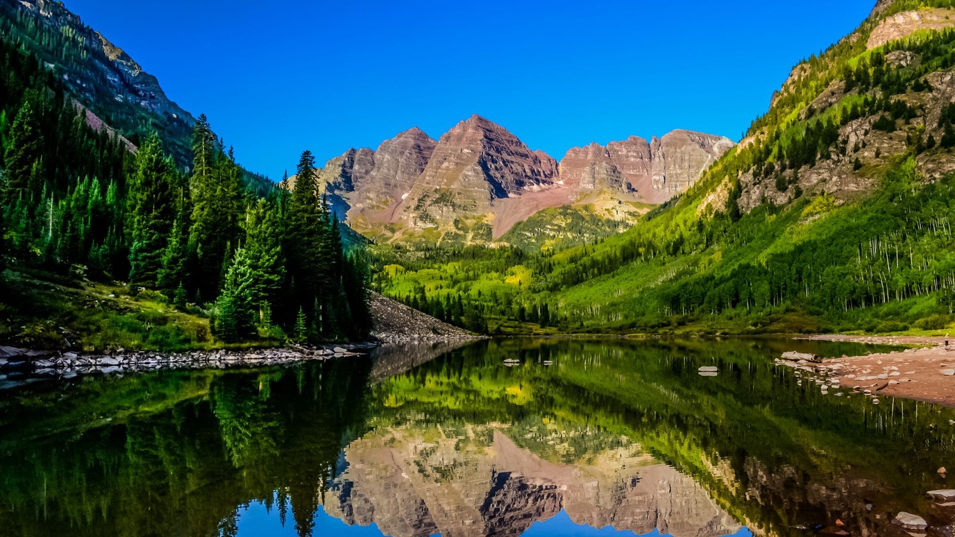 The Maroon Bells mirrored in Maroon Lake near Aspen, Colorado