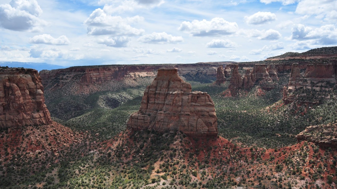Independence Monument and the canyon walls of Colorado National Monument above Grand Junction