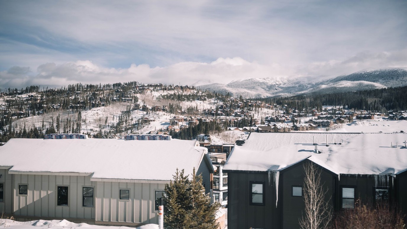 Snow covered mountain village and forested slopes at Steamboat Springs, Colorado